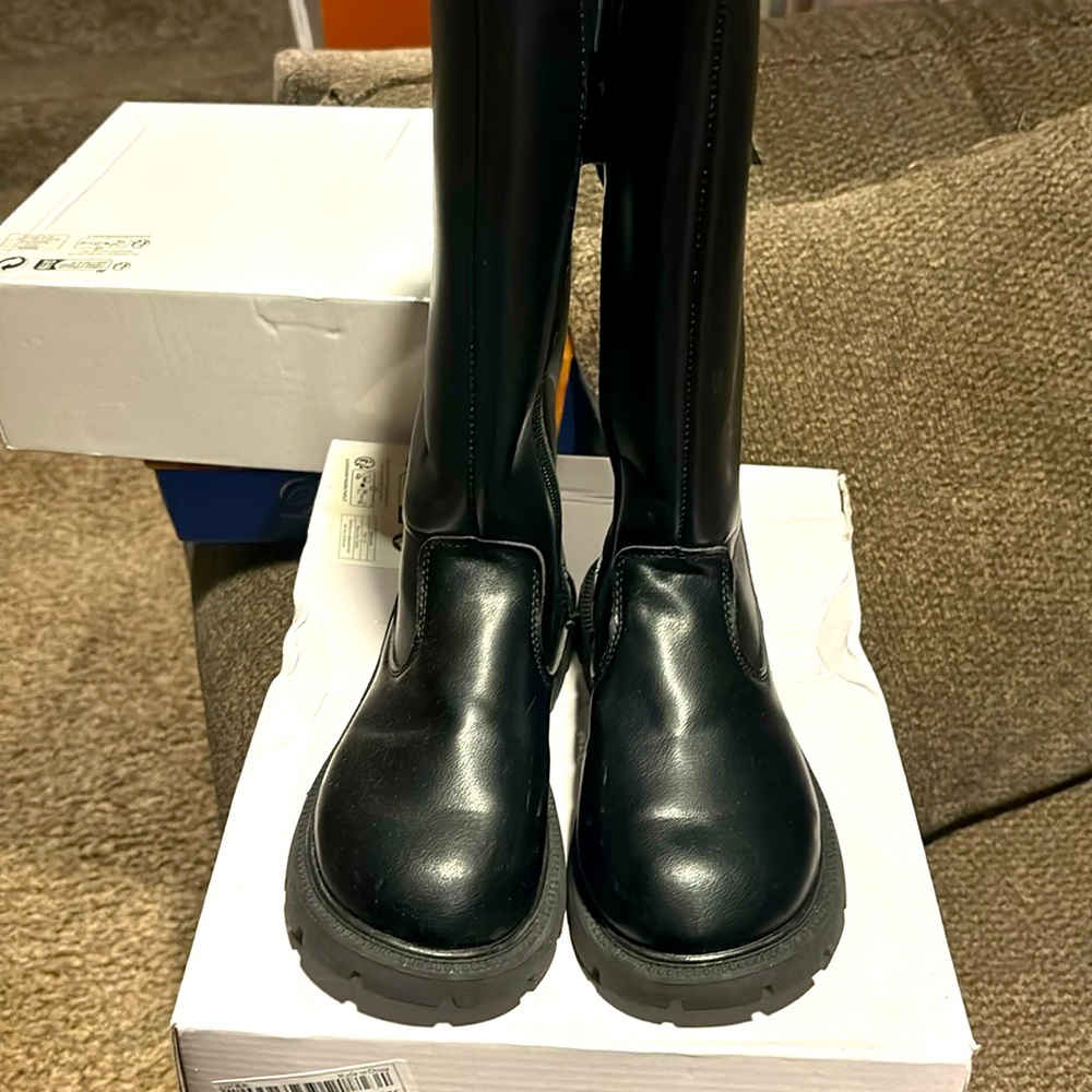 Girl a little below knee boots
